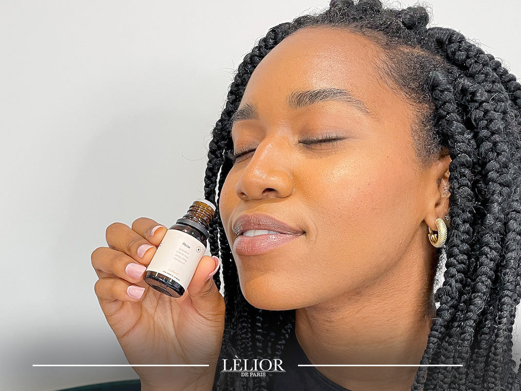 woman smelling fragrance | Scenting Techniques | Lèlior Blog